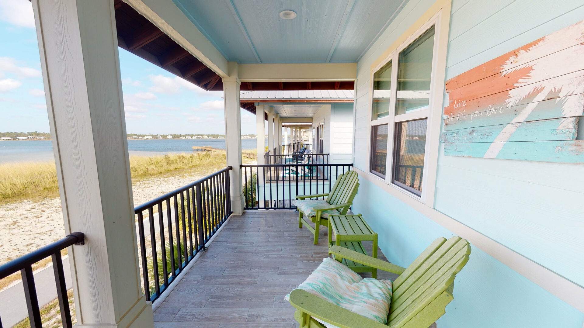 Private balcony off of the Master bedroom offers views of Little Lagoon