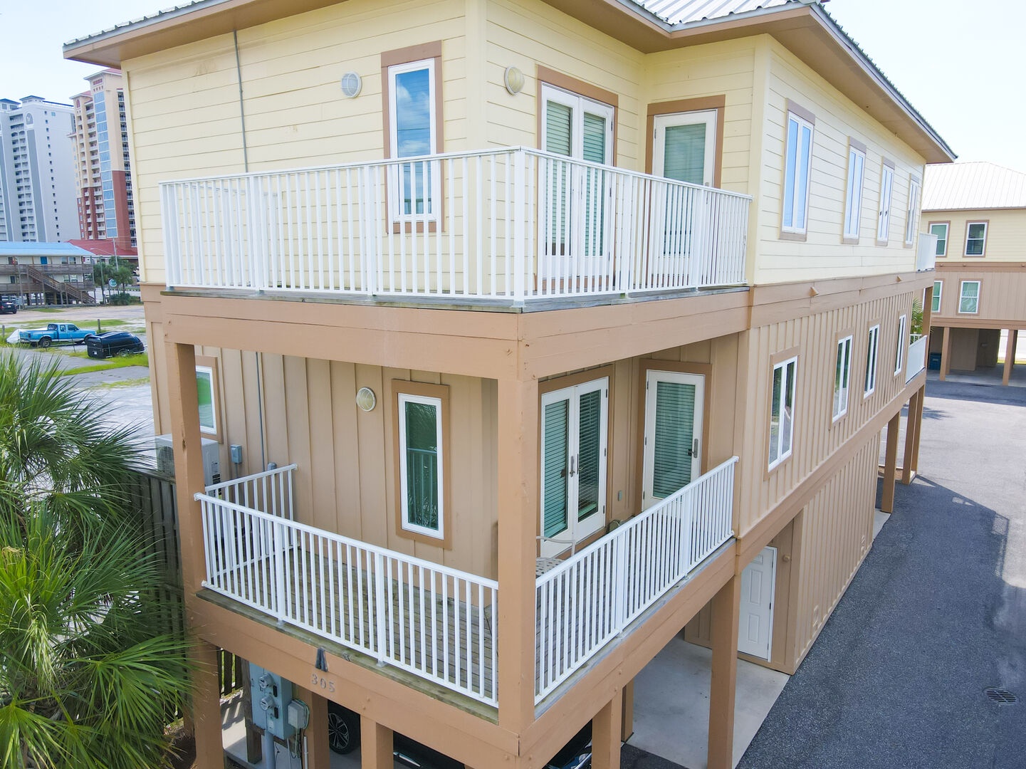 A 101 side of the Duplex has private balconies and covered parking