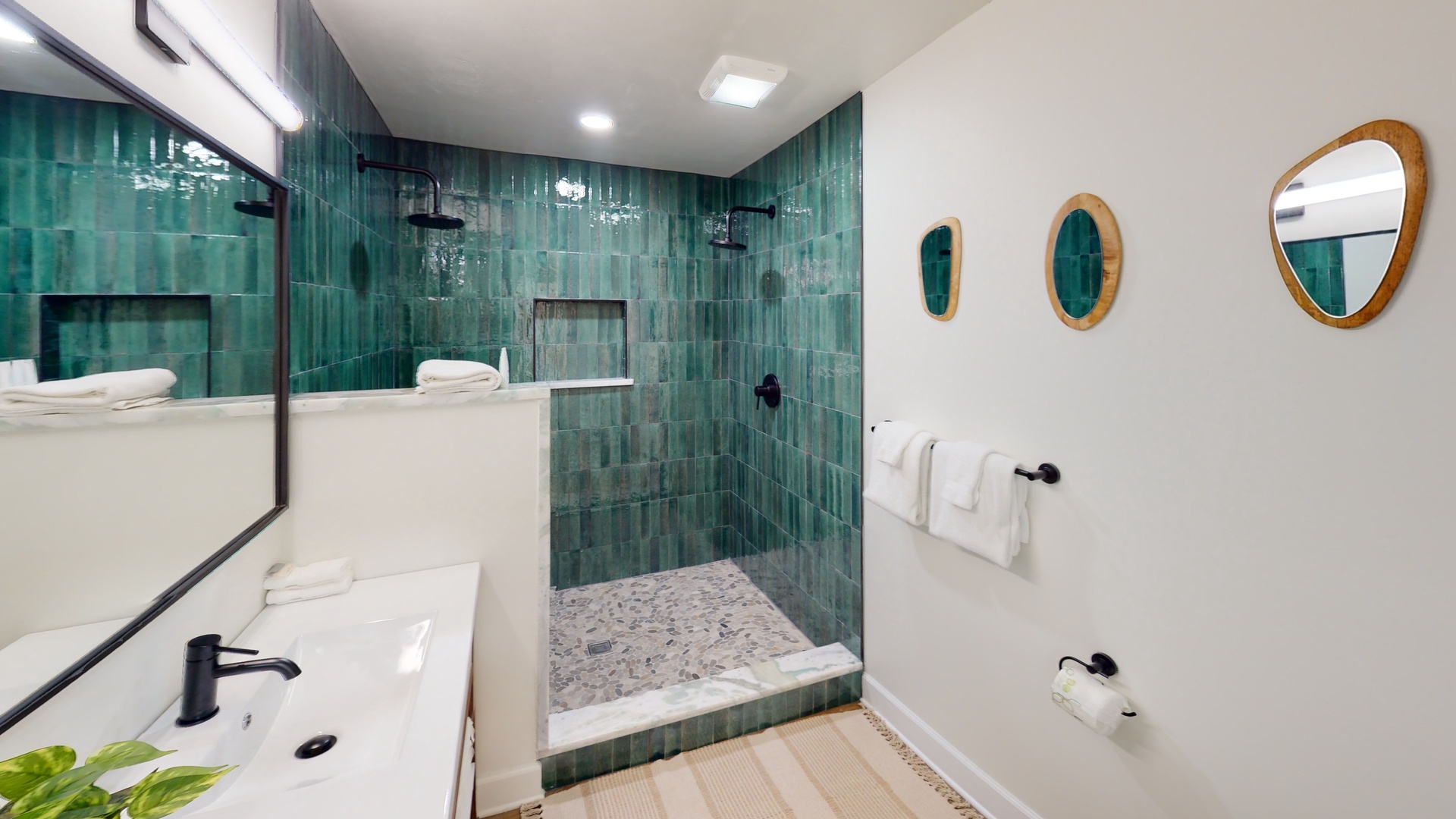 Beautiful tiled walk-in shower in the master bath