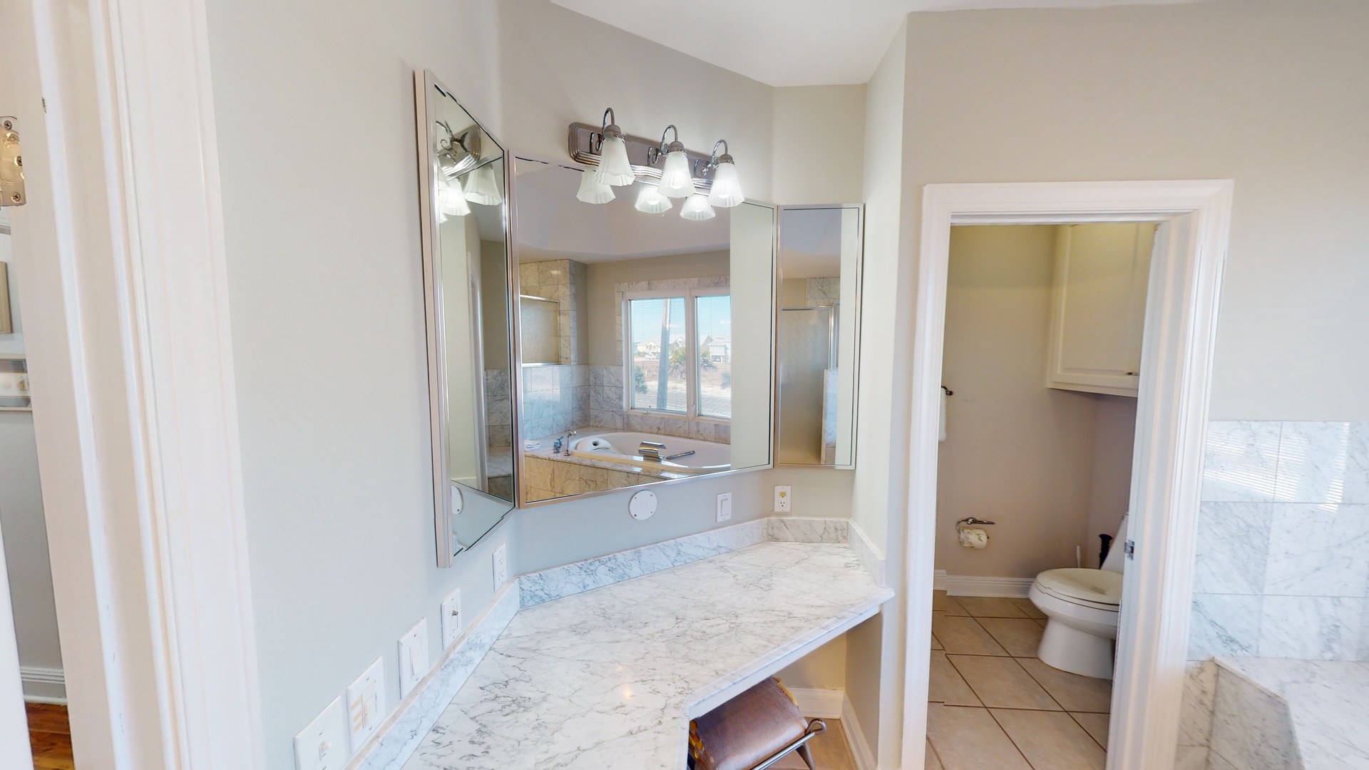 The Master bath has a separate makeup vanity and water closet