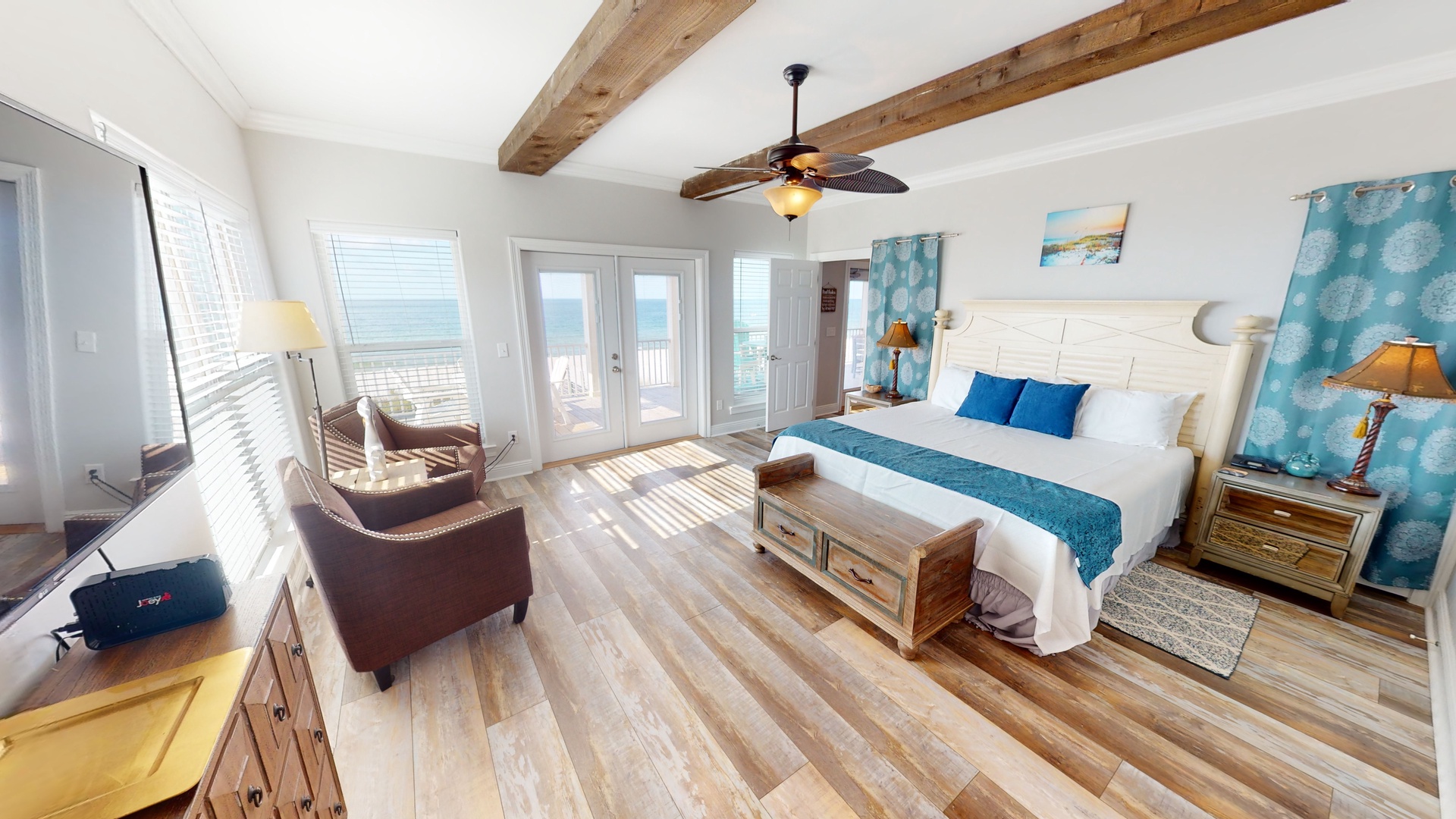 Master bedroom 1 is on the 1st floor with incredible Gulf views and deck access