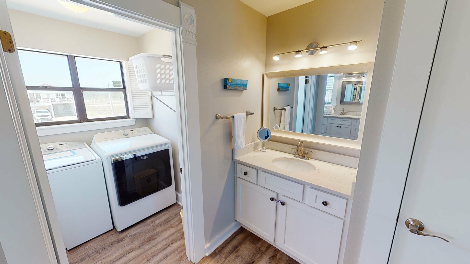 Off Master bedroom is a private bath and laundry room