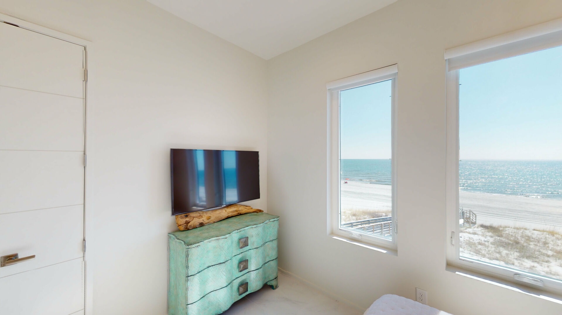 Bedroom 1 has a TV, Gulf views and a private bathroom