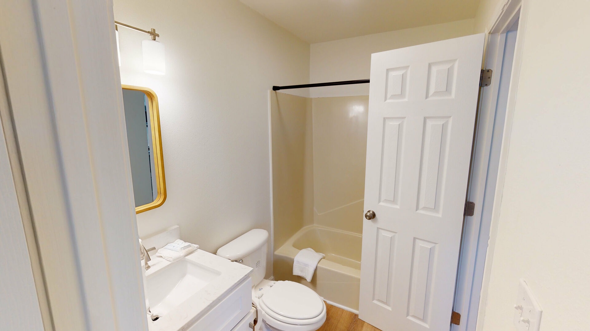 Private bathroom for bedroom #4  (B) with a tub/shower combo