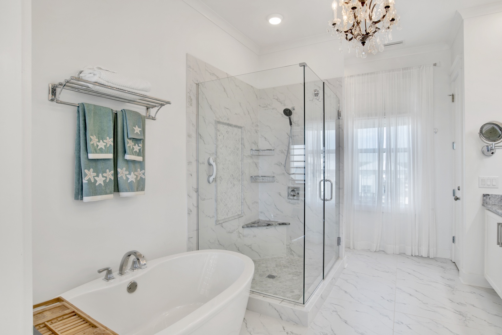 The master bath has a walk-in shower and a private water-closet