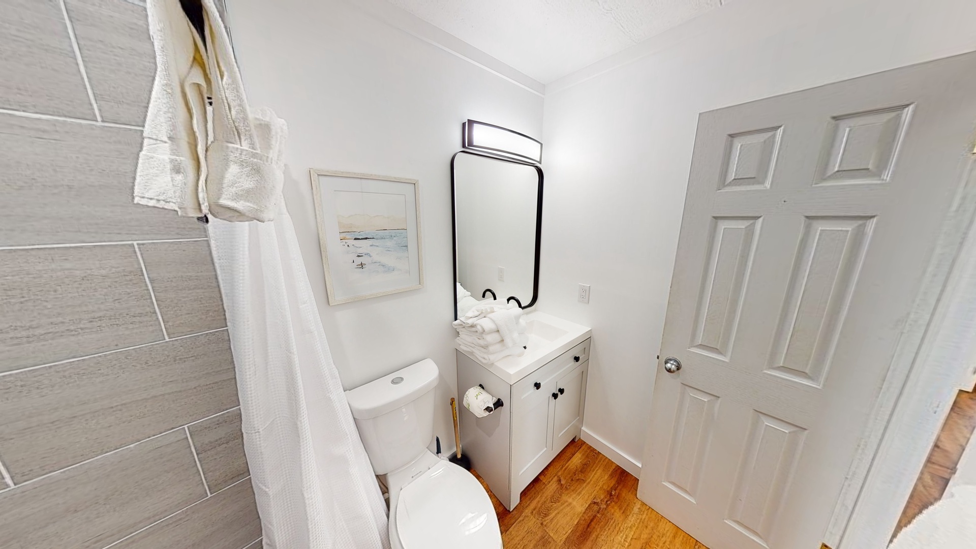 Hall bathroom with a walk-in shower