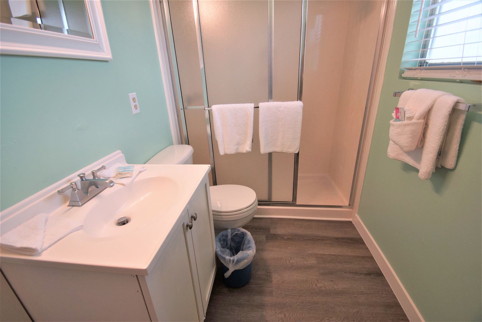 Shared hall bath with walk-in shower