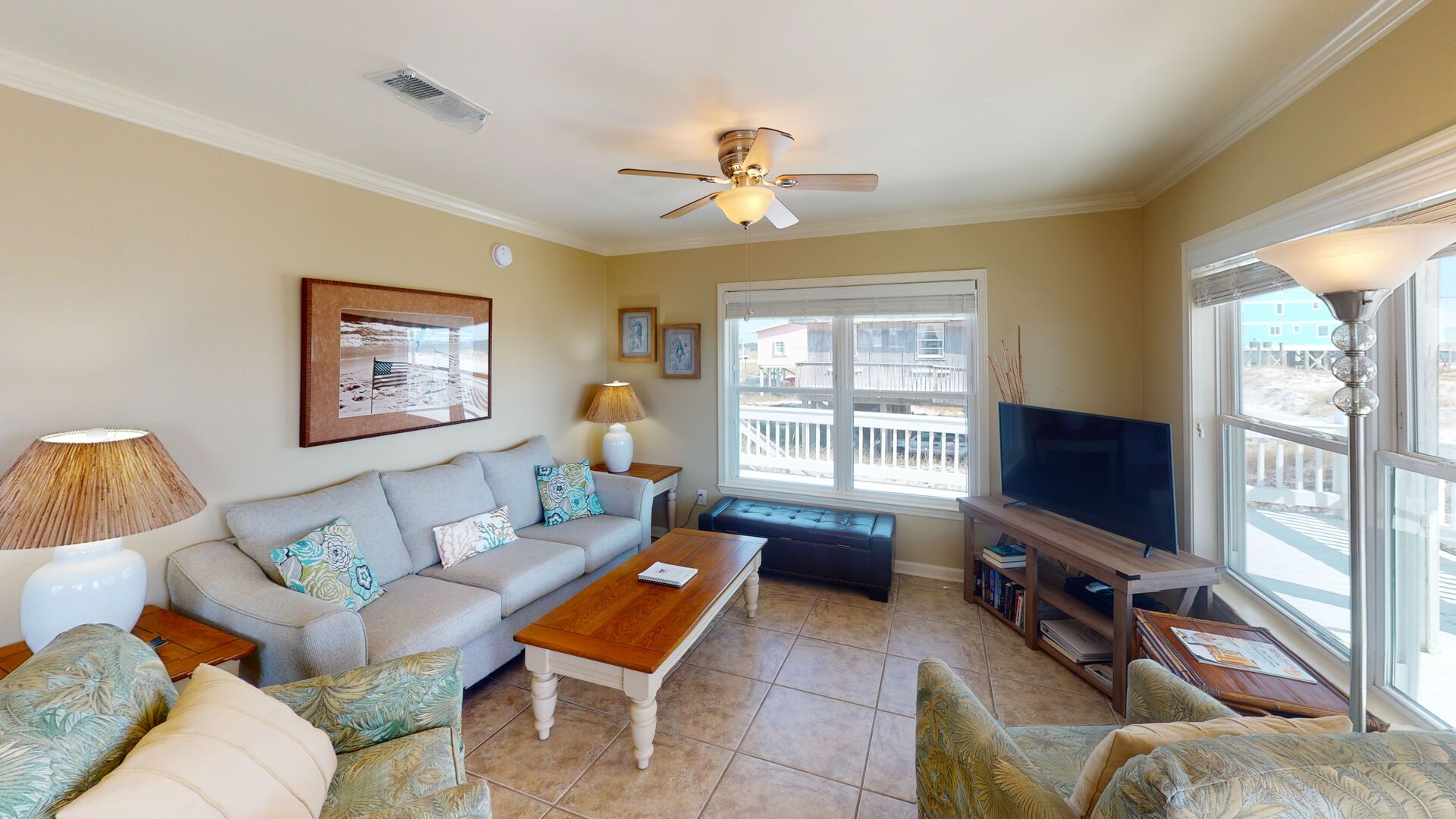 Plenty of seating in the comfortable living area and unobstructed views of the beach and sparkling Gulf!