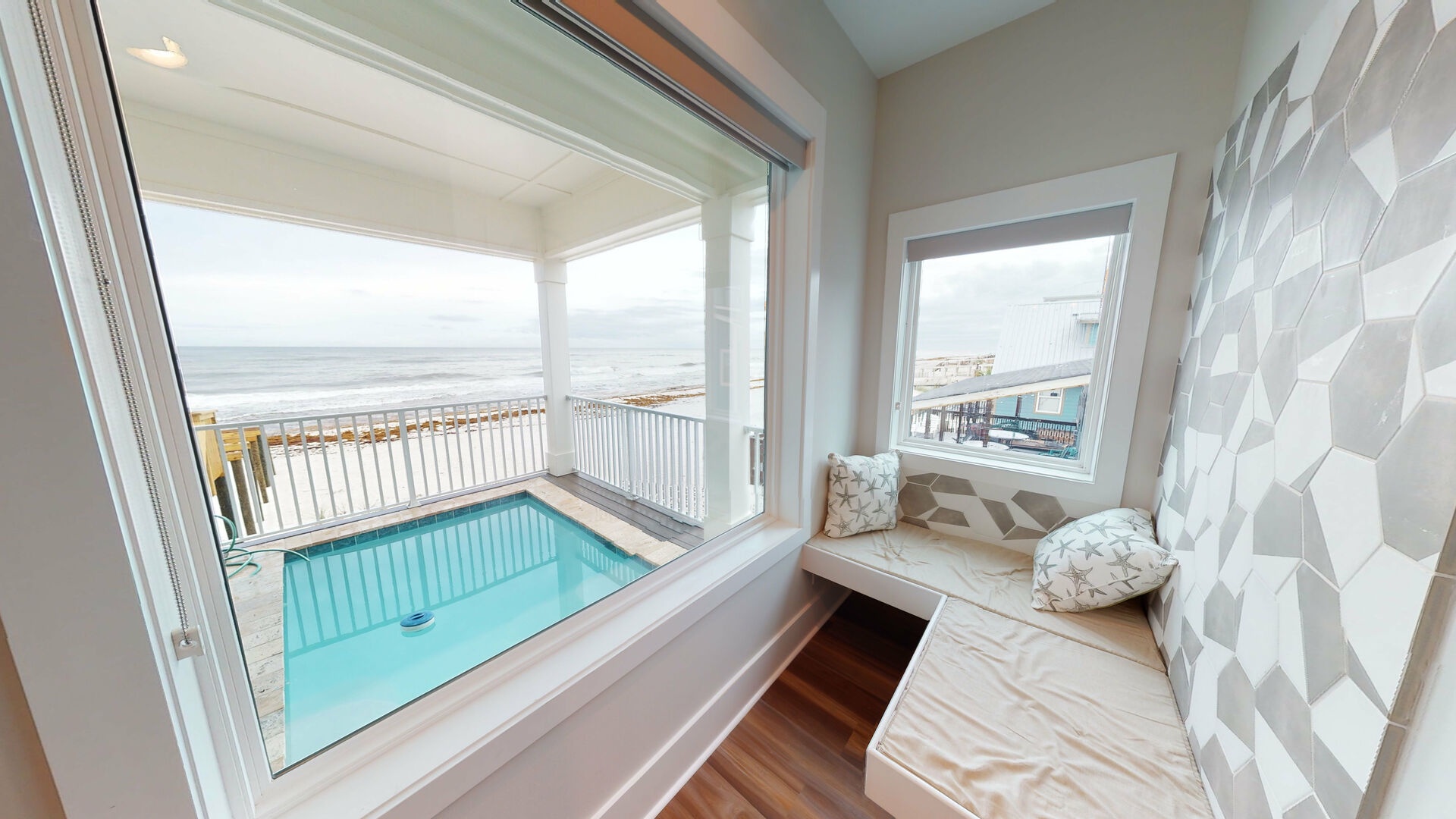 Fantastic views of the pool , beach and Gulf from the cozy window seat on the 1st floor