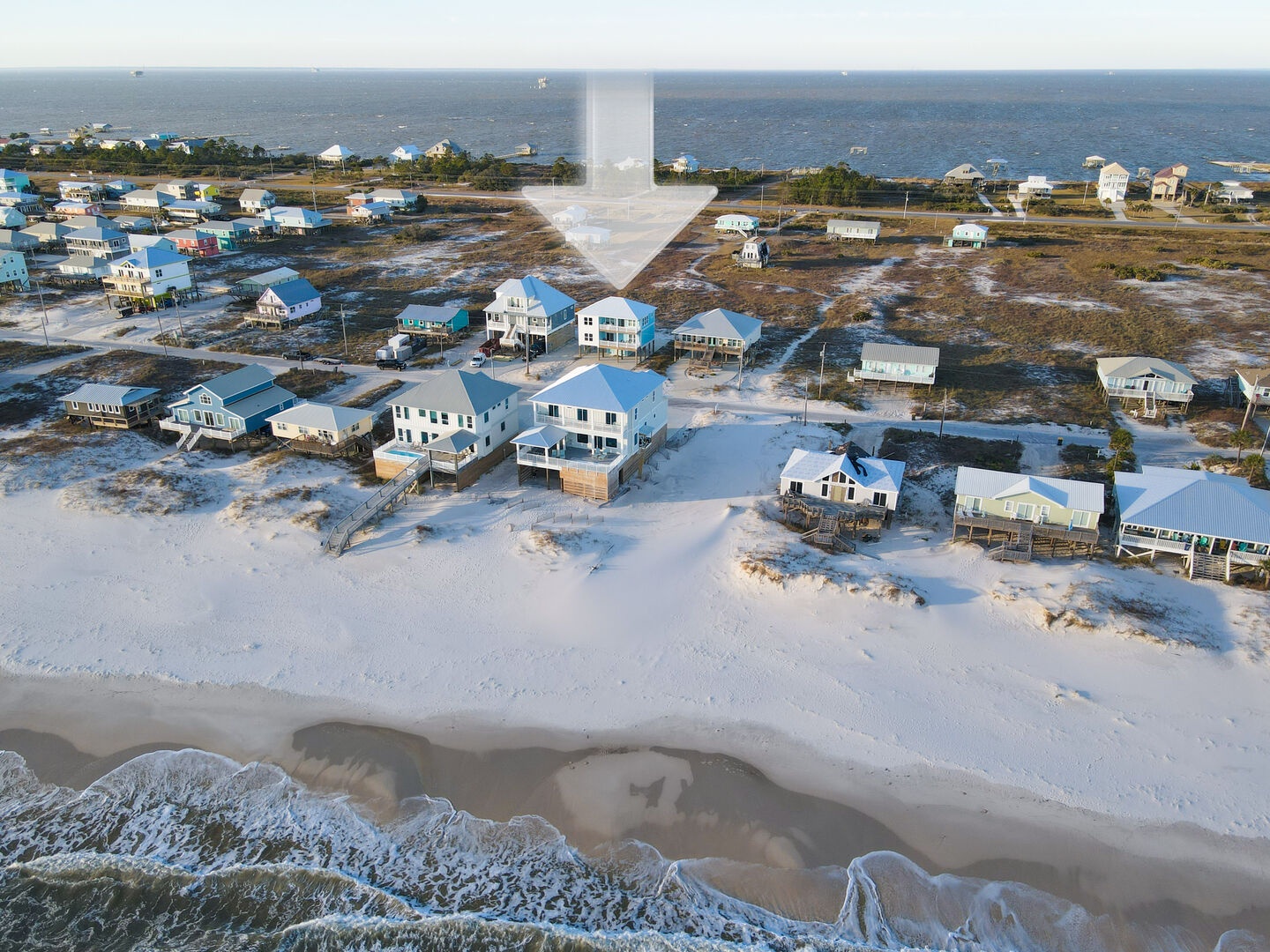 Aerial view of home and beach