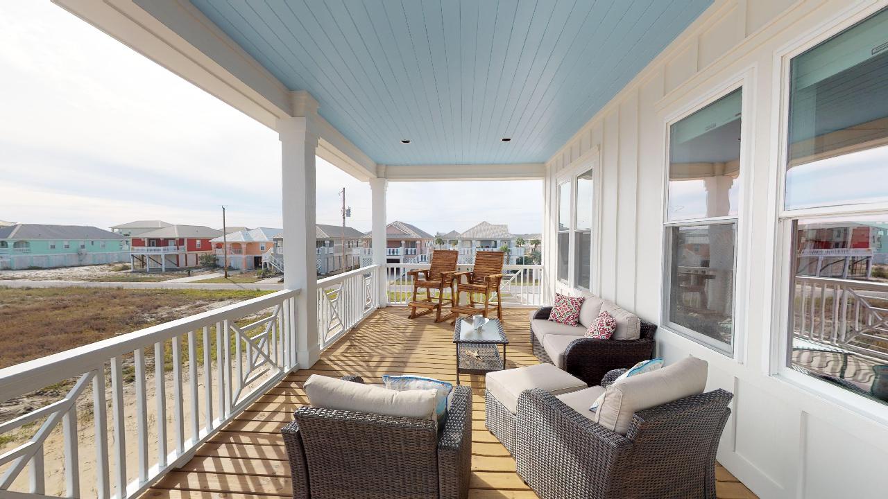 Relax on the huge porch and enjoy the view from several chairs