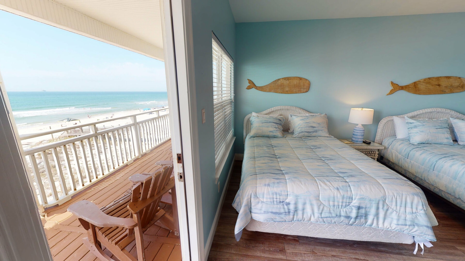 Bedroom 6 features 2 queen beds- sleeps 4, TV with cable, access to the balcony with beach views and an attached, private bathroom