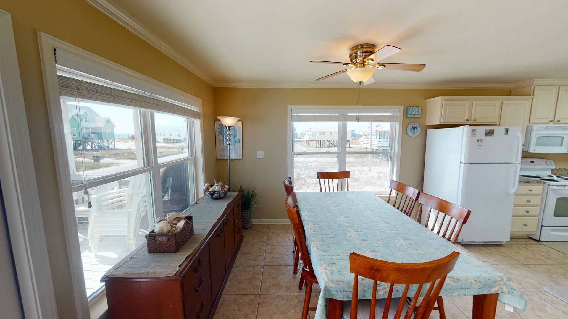 The dining room sits 6 with a sideboard to set up a family buffet