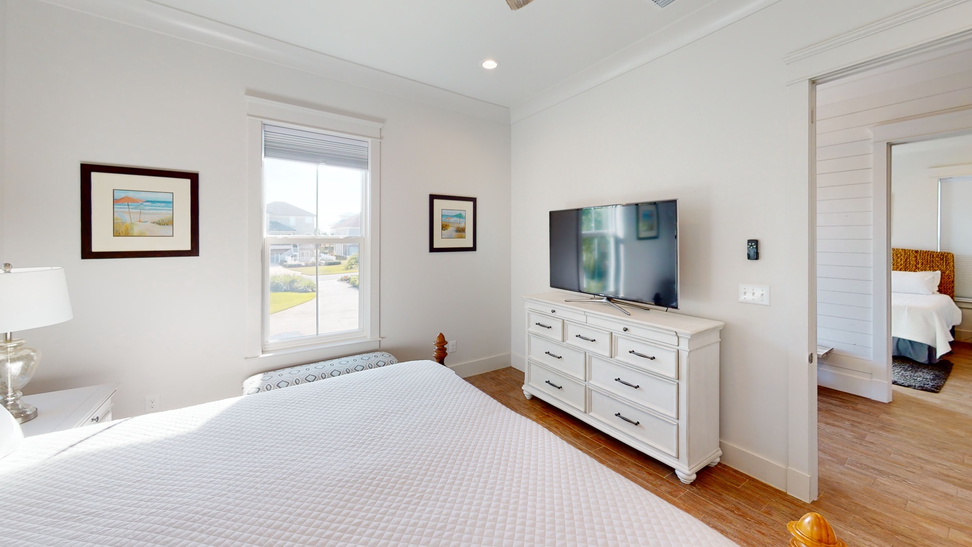 The Master bedroom features a TV and a private luxury bathroom.