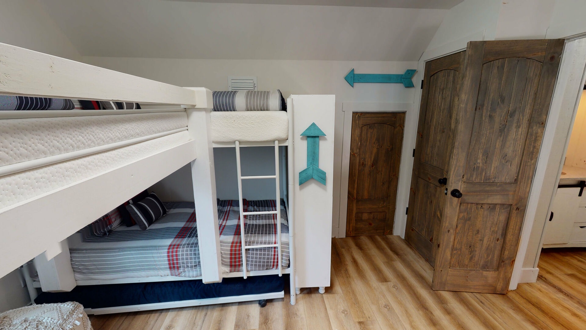 2nd level, Bedroom #4 is a kids bunk room with 3 twin beds and a pull-out trundle