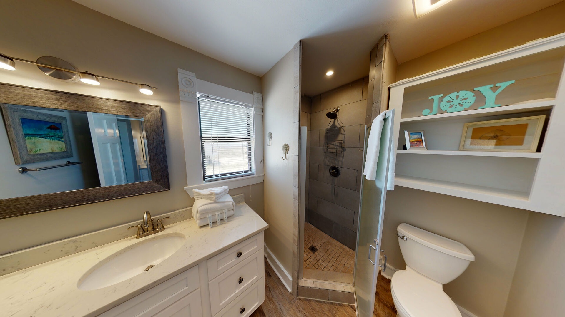 Large open master bath with laundry room and walk-in shower