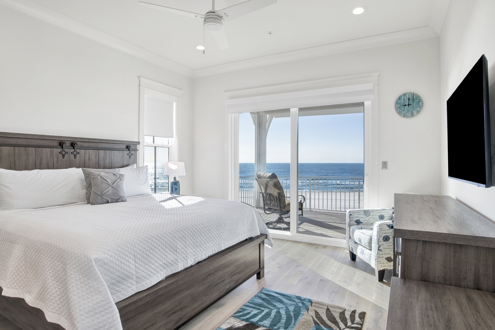 Bedroom 4 is on the 2nd floor with a king bed, TV, Gulf views and balcony access