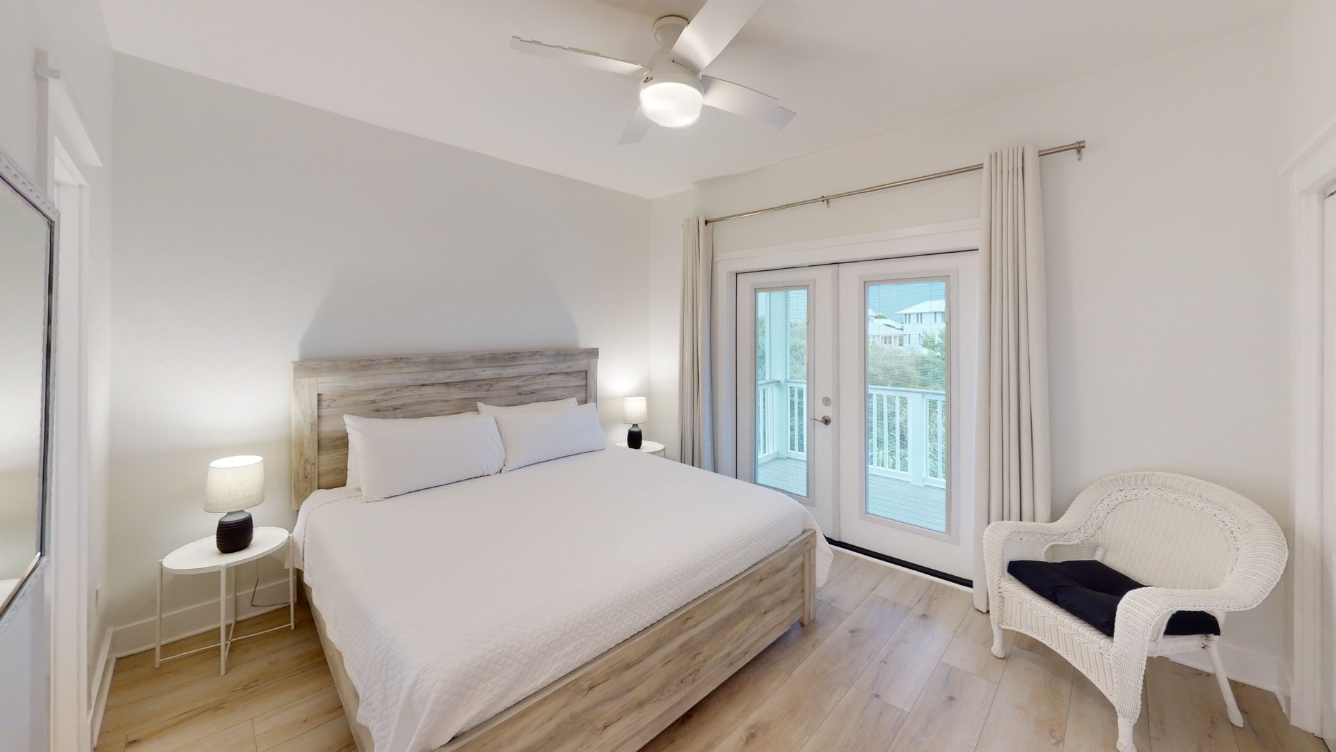 Big Blue-Bedroom 4 is on the 3rd floor with a king bed, ceiling fan, TV, balcony access and a private bathroom