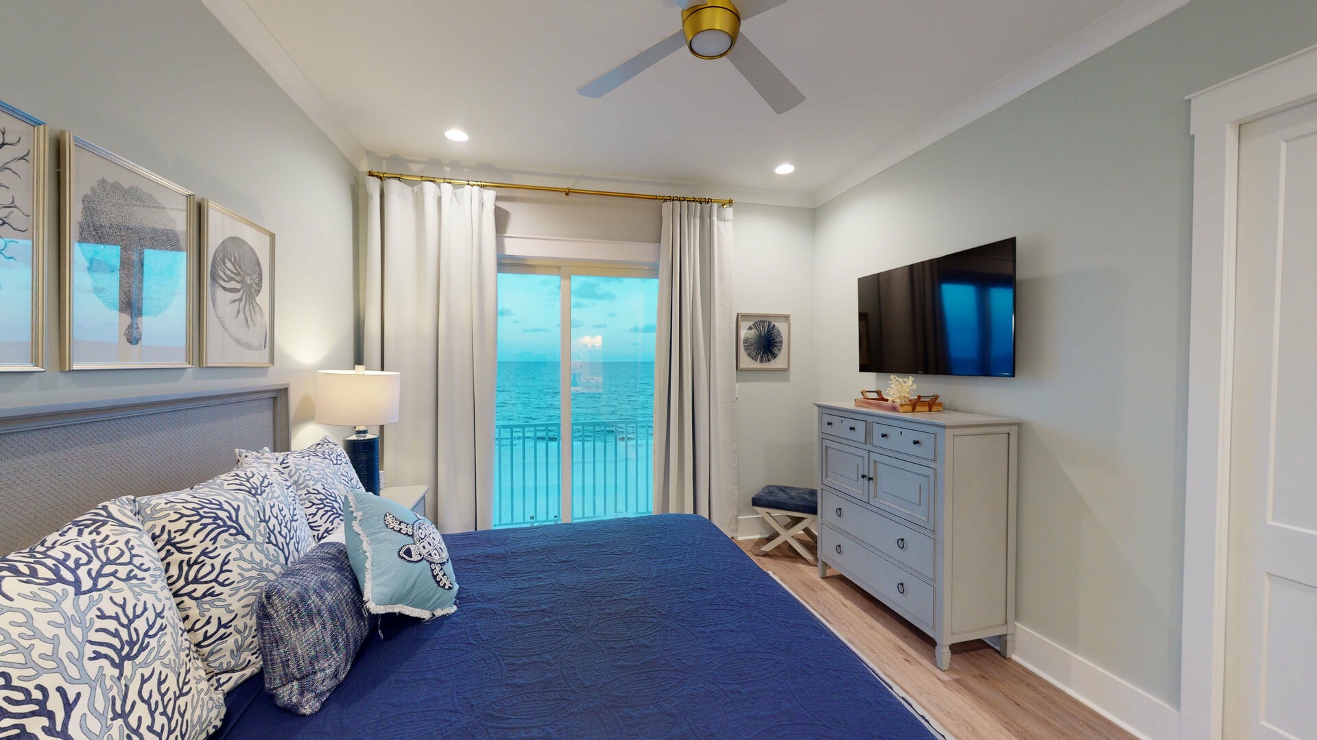 Bedroom #5 features a private balcony, gulf views, TV and a private bathroom