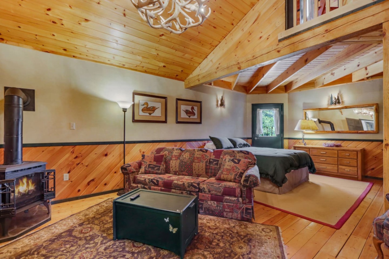 Cozy up in your rustic retreat with warm wood beams, crackling fireplace, and mountain lodge charm that makes every evening feel special.