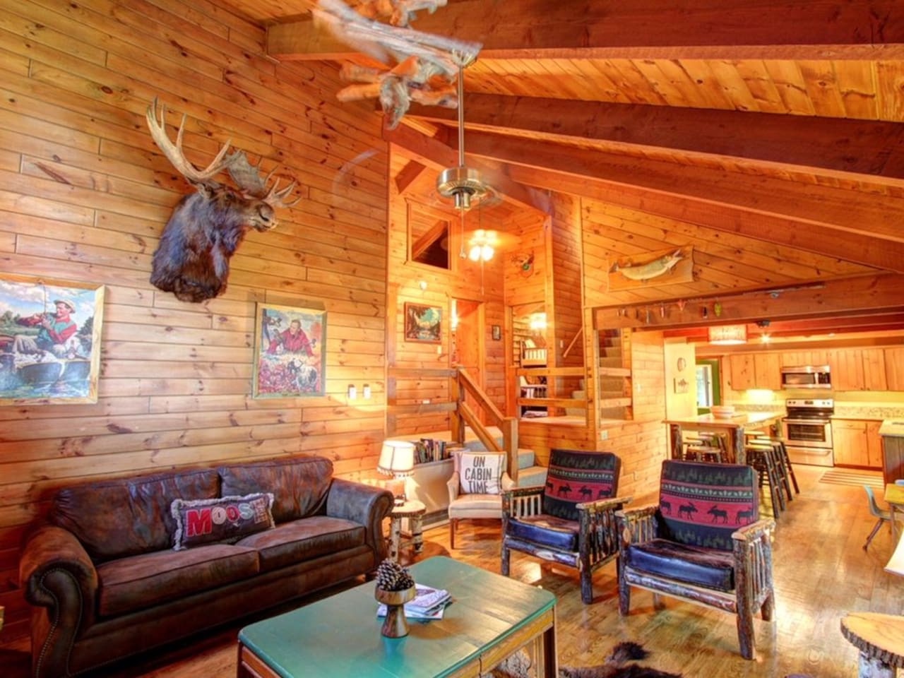 Unwind in your rustic cabin retreat with soaring ceilings, cozy leather seating, and authentic lodge décor that makes you feel right at home.