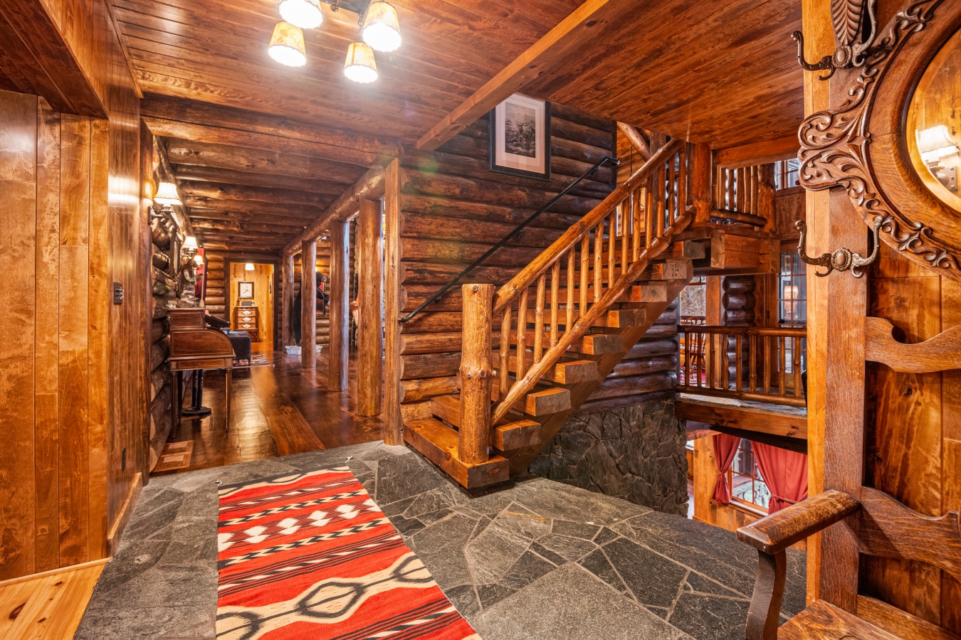 Step into your rustic log cabin sanctuary where warm wood surrounds you and handcrafted details create the perfect mountain retreat atmosphere.