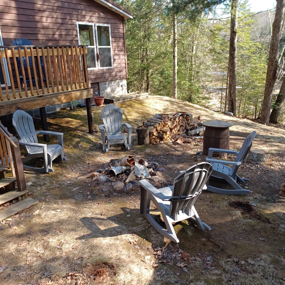 Gather around your private fire pit surrounded by comfortable seating, with plenty of firewood ready for cozy evenings under the stars.
