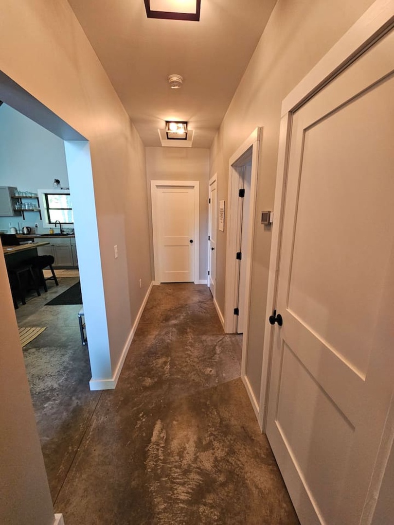 Step through your welcoming hallway with gleaming floors and skylights that bathe the space in natural light.