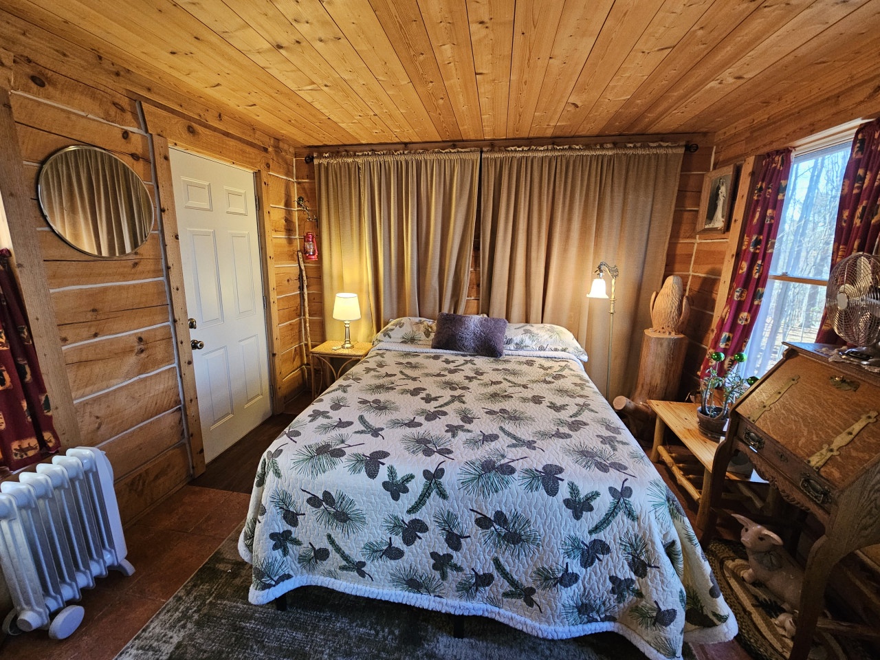 Cozy cabin bedroom with rustic log walls, soft linens, and warm lighting creates your peaceful mountain retreat sanctuary.