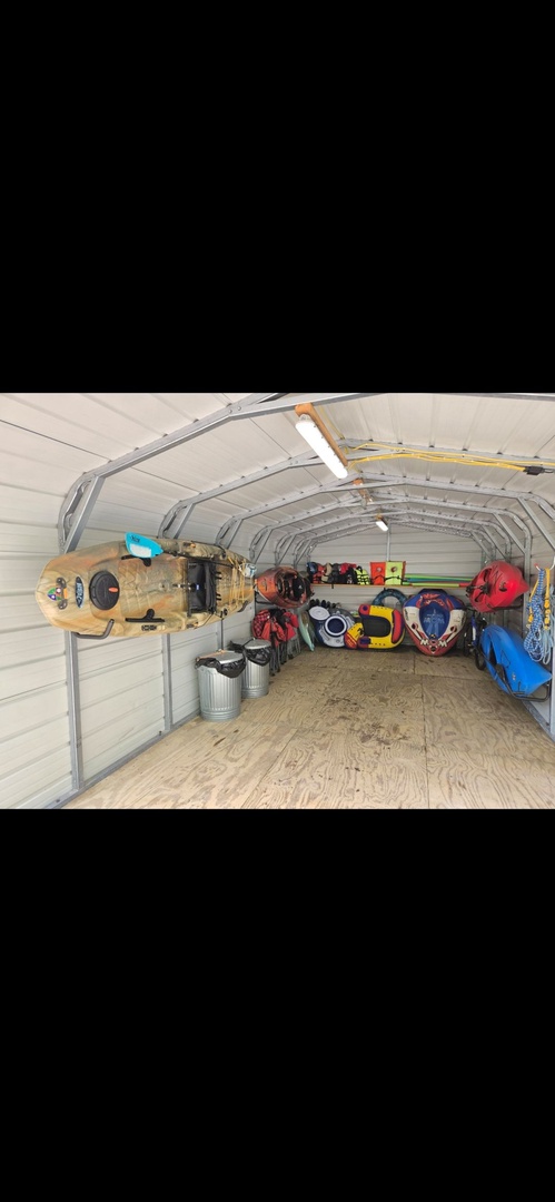 Your gear stays dry and organized in this spacious storage shed, perfect for snowboards, skis, and all your outdoor equipment.