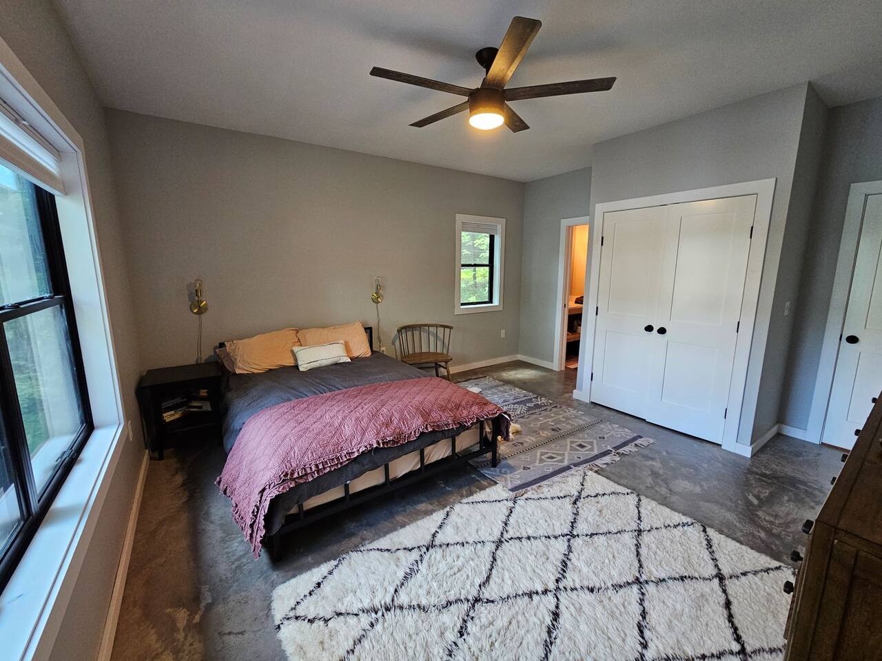 Settle into your serene bedroom where soft textures and gentle lighting create the perfect retreat for restful nights.