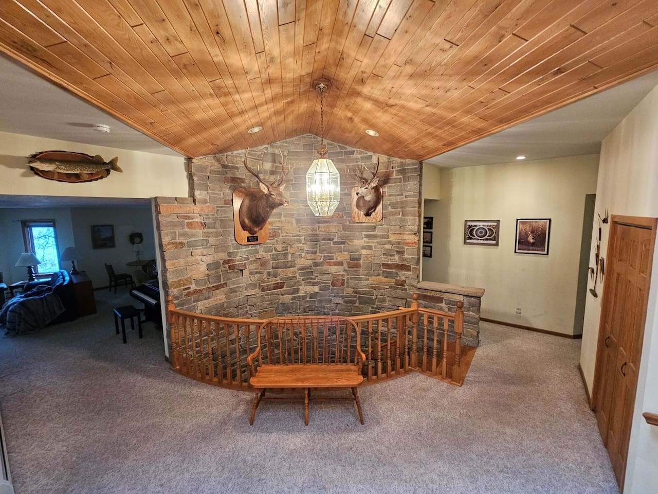 Gather in your rustic retreat where warm wood ceilings and stone walls create the perfect spot for memorable conversations.