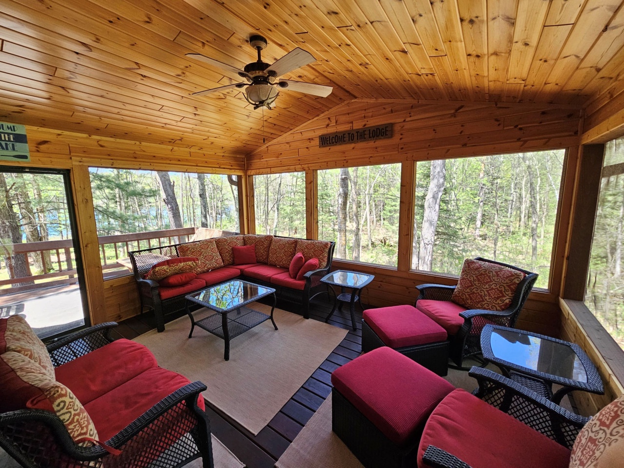 Unwind in your screened-in porch with cozy seating and forest views - the perfect spot for morning coffee or evening conversations.