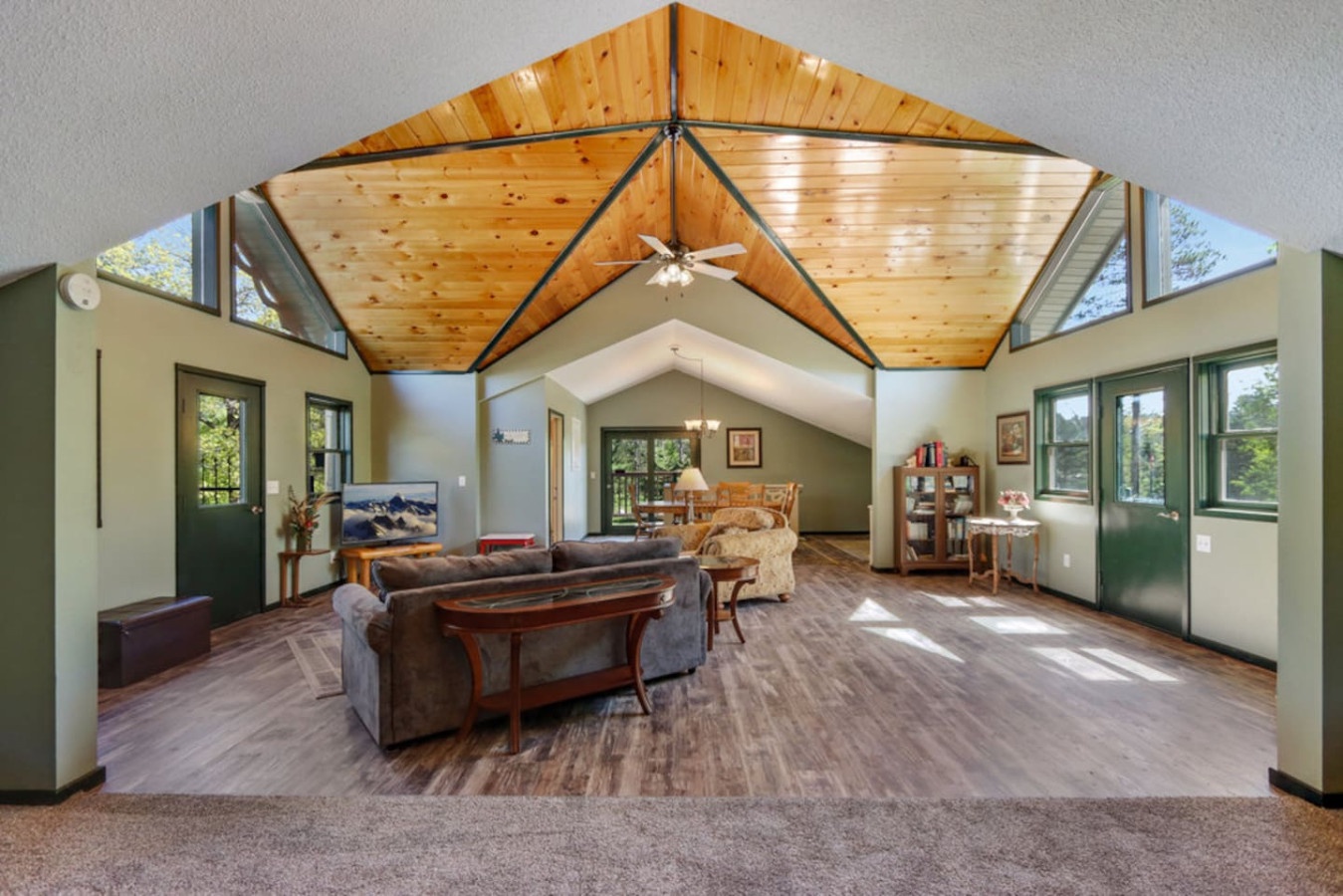 You'll love the soaring wood ceiling and open layout that creates a warm, airy retreat perfect for relaxing together.