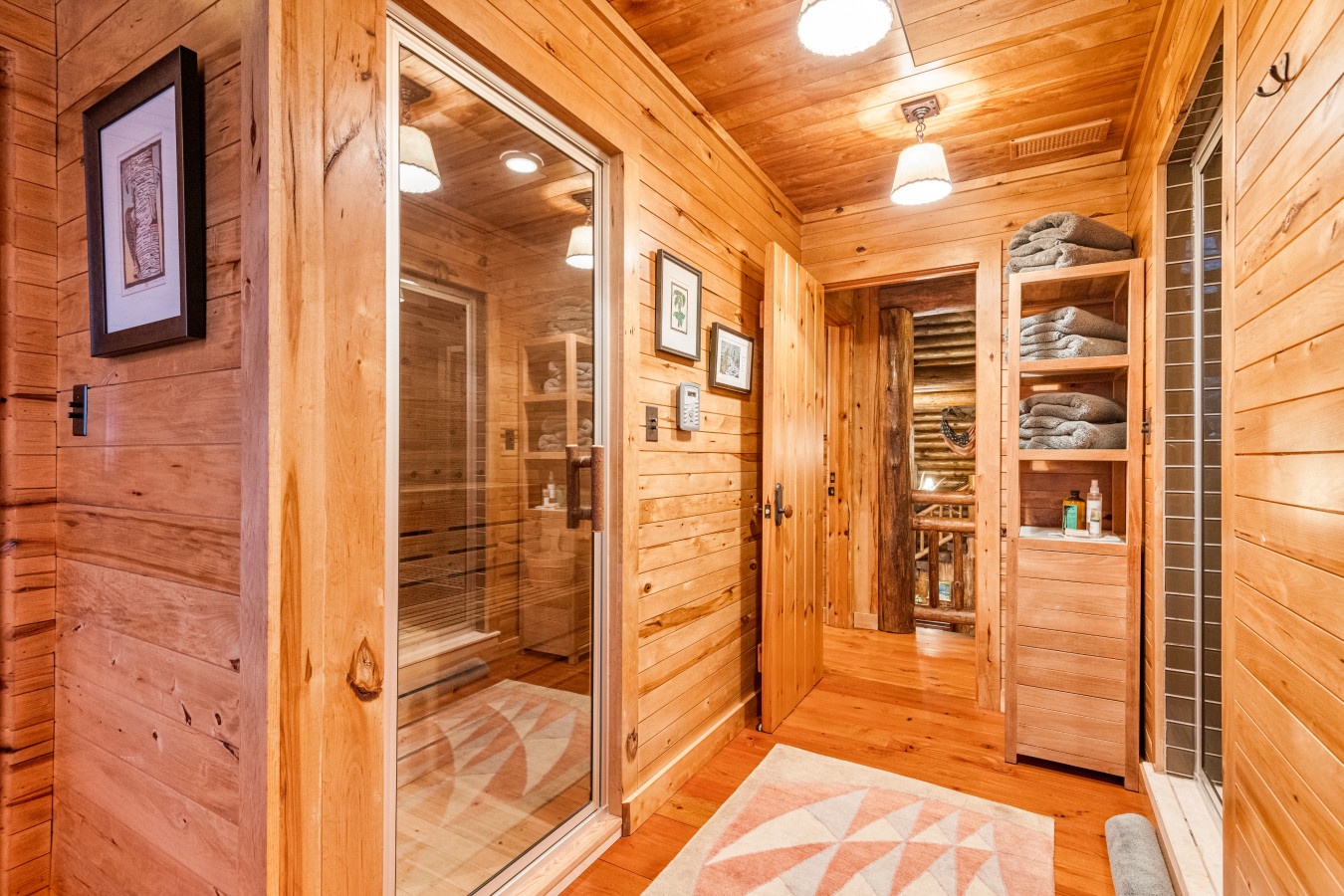 Your private wellness sanctuary awaits with an authentic wood sauna and steam room, complete with fresh towels ready for pure relaxation.