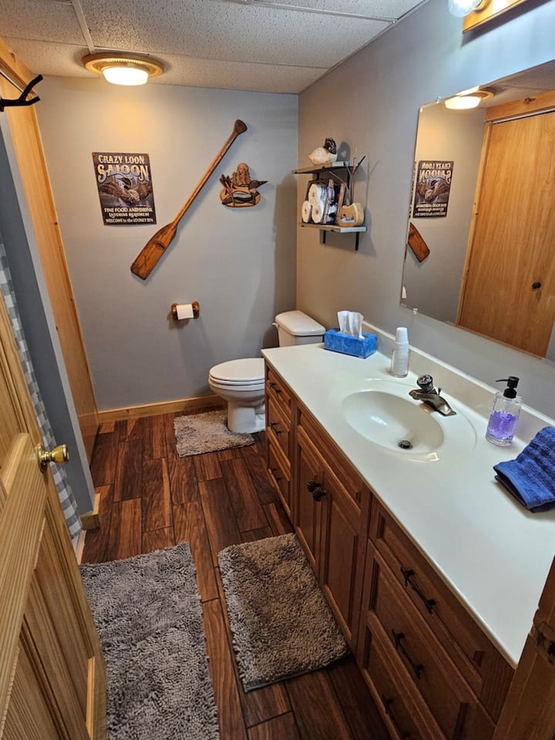 Step into your charming themed bathroom where rustic decor meets comfort, featuring western touches that make your morning routine feel like an adventure.