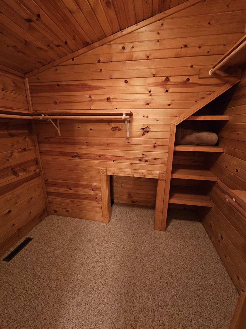 Your cozy cedar closet offers abundant storage with built-in shelves and hanging space, creating an organized retreat for all your belongings.