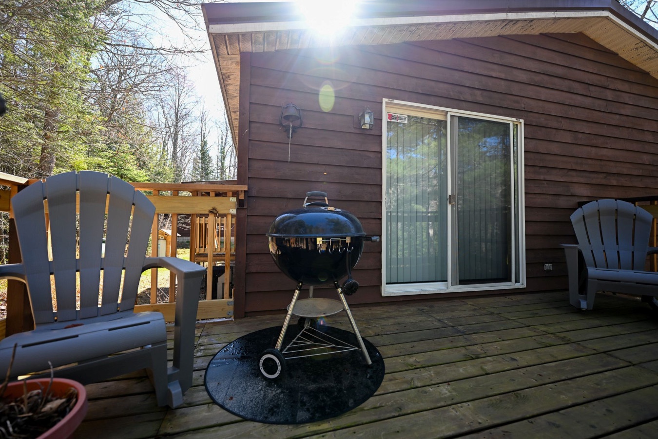 Fire up your vacation with outdoor grilling on your private deck, surrounded by peaceful woodland views.