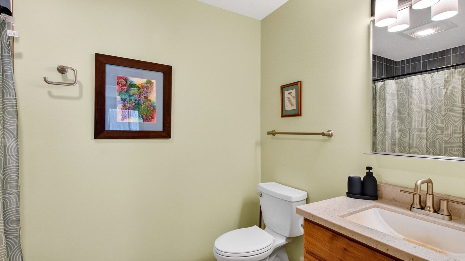 Step into your private bathroom featuring modern amenities and thoughtful touches that make your stay comfortable and convenient.