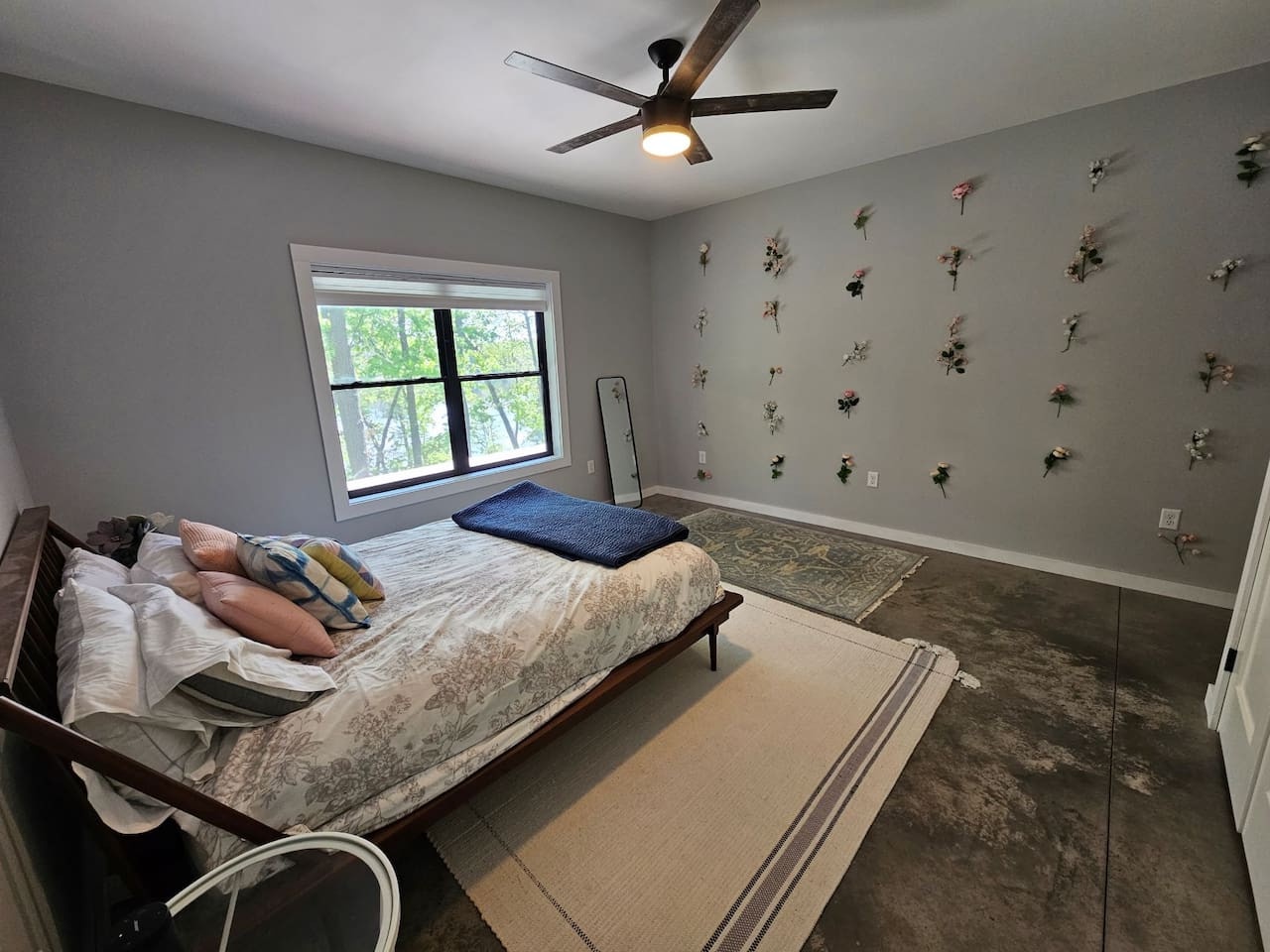 Wake up to soft floral touches on your wall and natural light streaming through your window.