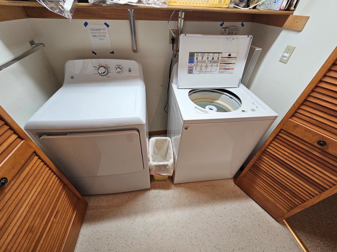Your dedicated laundry space makes extended stays effortless with full-sized washer and dryer tucked into beautiful wood cabinetry.
