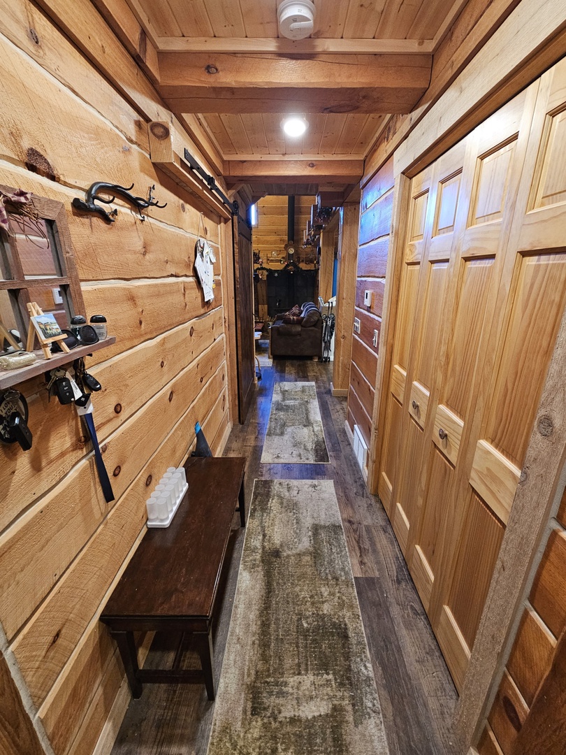 Step into your rustic ski prep area with handcrafted wooden storage for all your gear and cozy alpine charm.