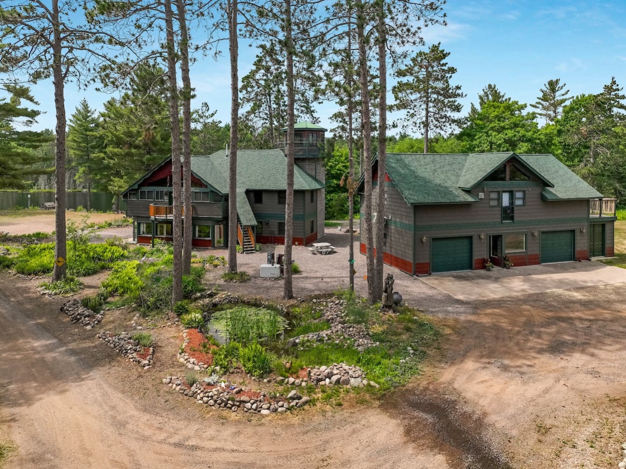 Spacious lakeside retreat nestled among towering pines with scenic grounds and modern amenities for memorable getaways.