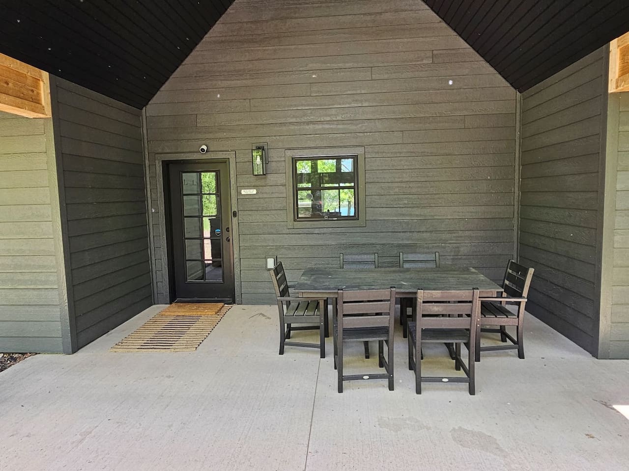 Step onto your covered patio where outdoor dining awaits—perfect for morning coffee or evening meals in the fresh air.