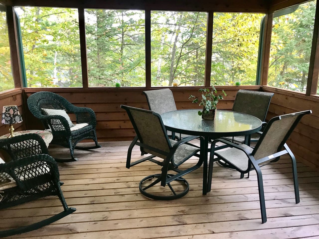 Unwind in your screened porch with forest views, perfect for morning coffee or evening relaxation among the trees.