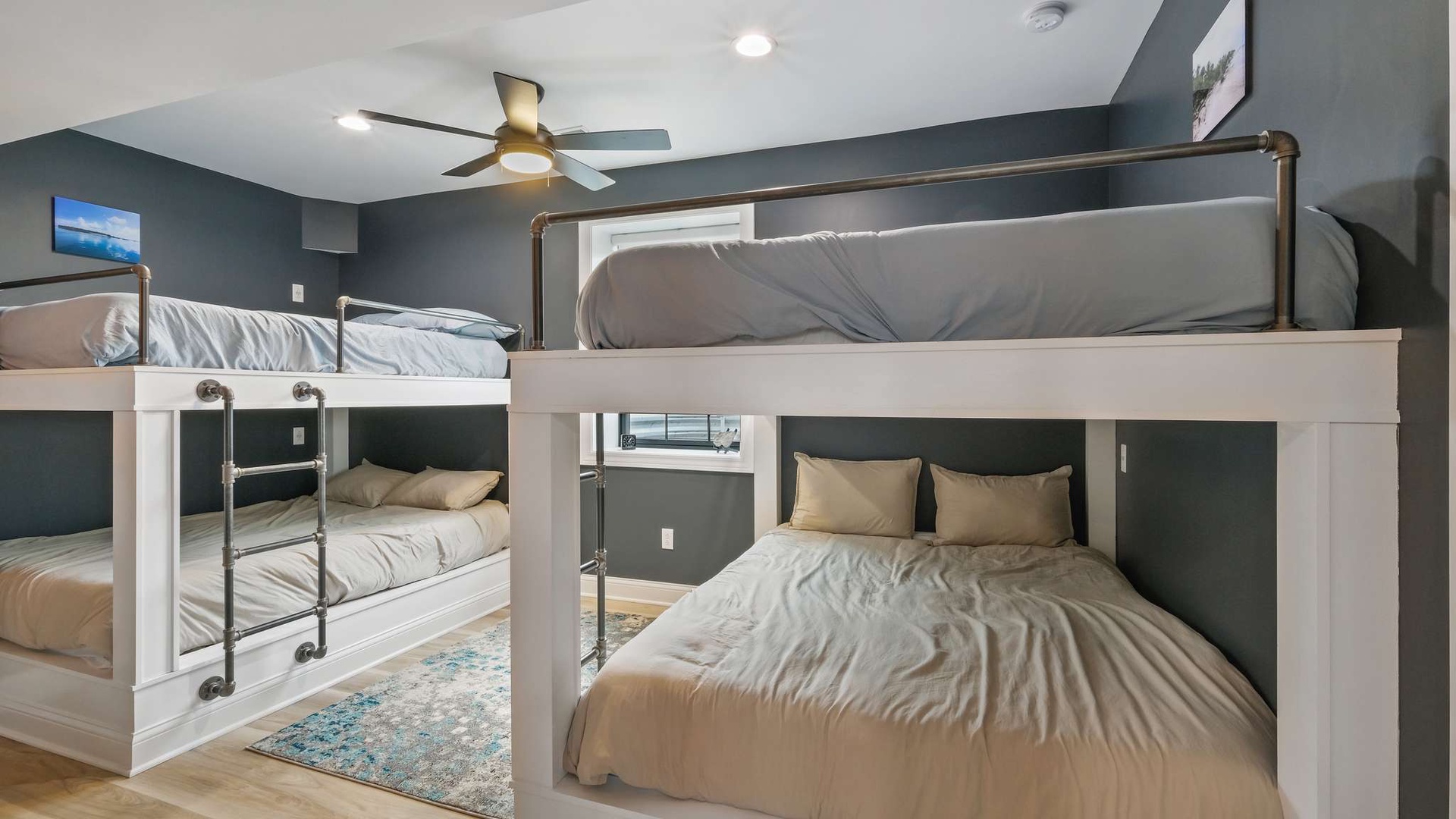 Sleep soundly in this thoughtfully designed bunk room where modern comfort meets smart space-saving design, perfect for families or groups.