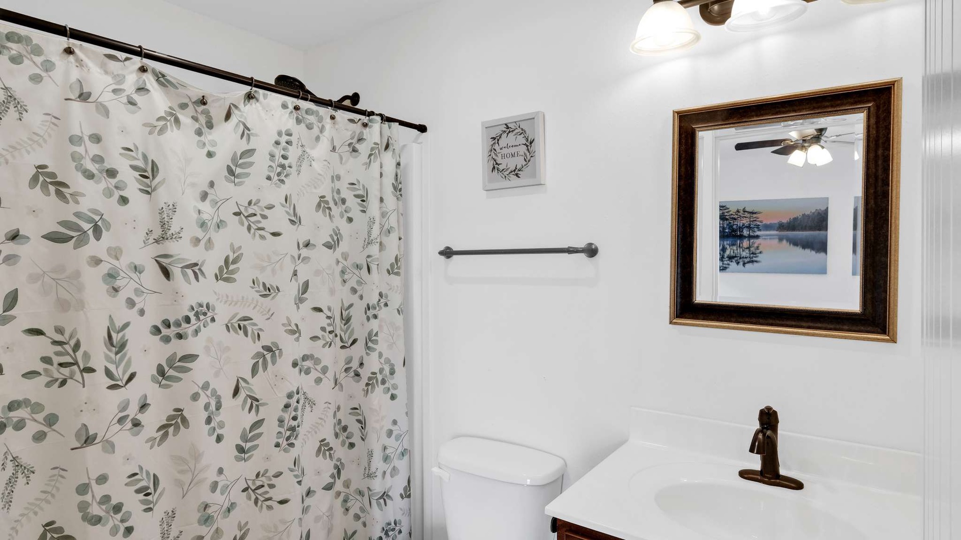 Refresh in your private bathroom with charming botanical touches and thoughtful amenities for a peaceful start to your day.