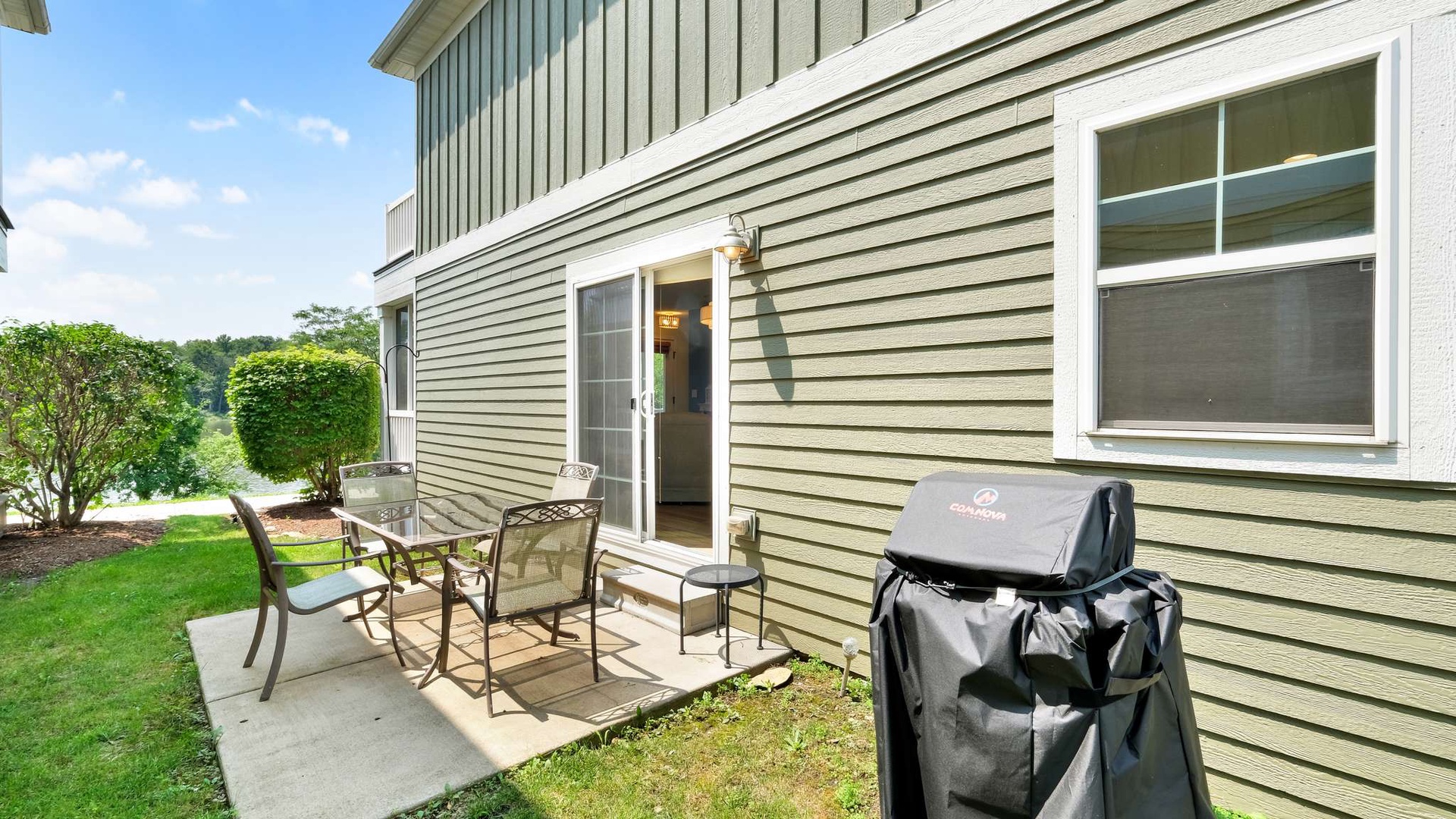 Step onto your private patio where outdoor dining and BBQ memories await, complete with comfortable seating and grilling station.