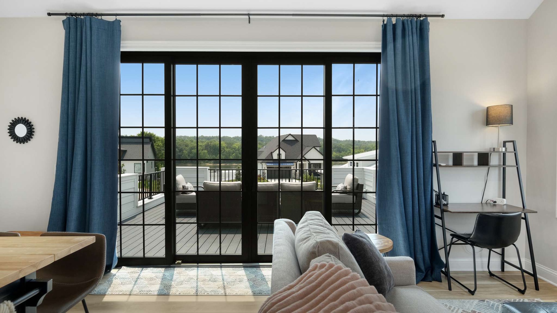 Your bright living space opens to a private balcony where you can unwind with scenic views of the peaceful neighborhood.