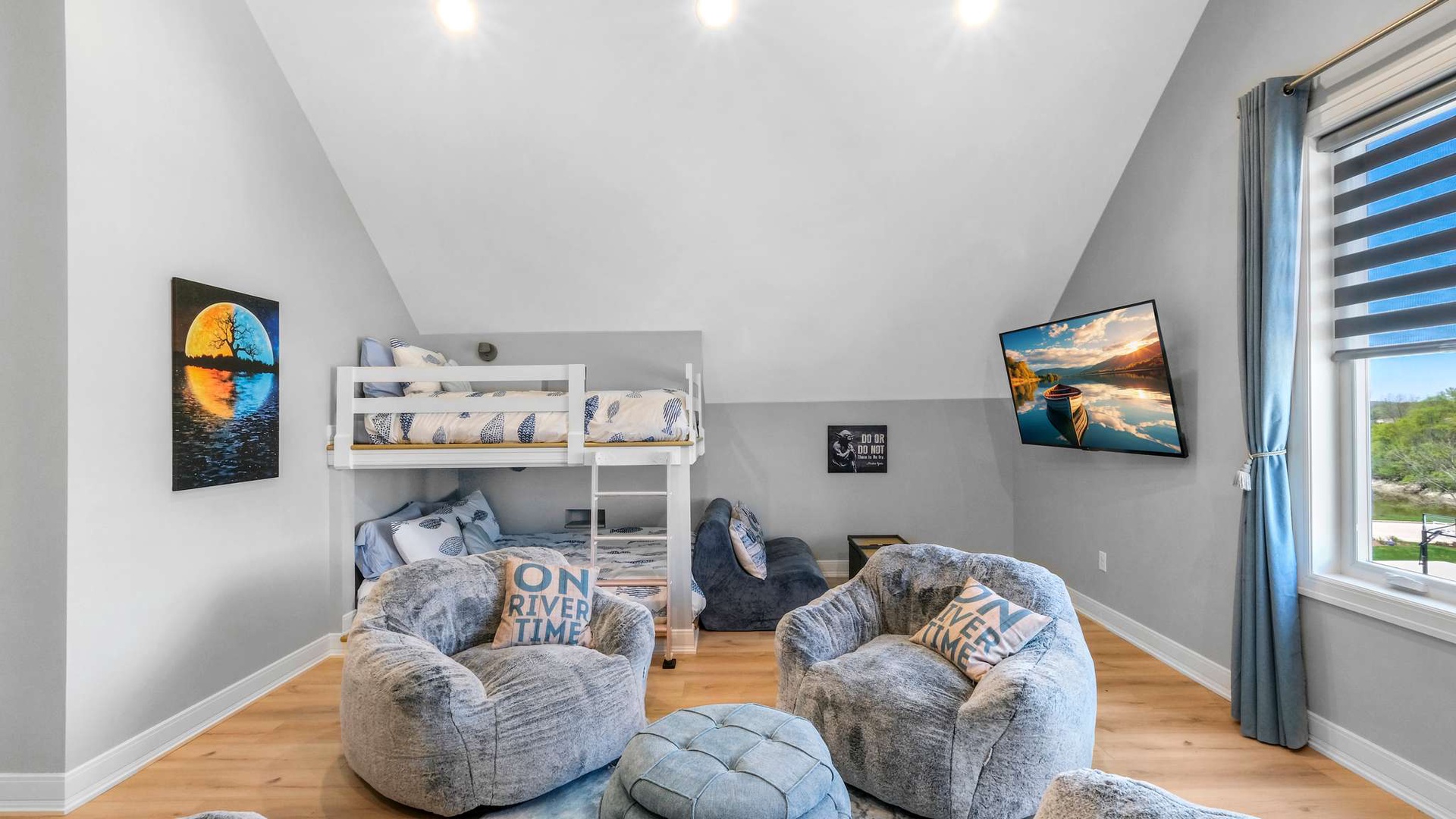 Relax in your cozy lounge with plush bean bag seating, bunk bed nook, and entertainment setup perfect for unwinding after adventures.